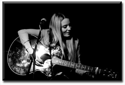 Abi Phillips vocalist acoustic guitar performer Hollyoaks